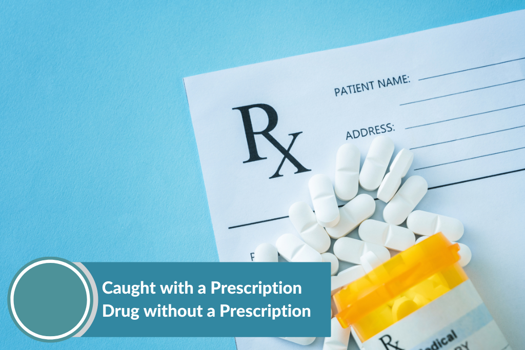 prescription, bottle, and prescription drugs scattered on a table